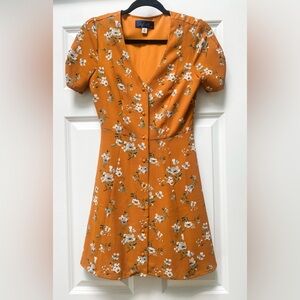 FRANCESCA’S | Button down dress with bow in back